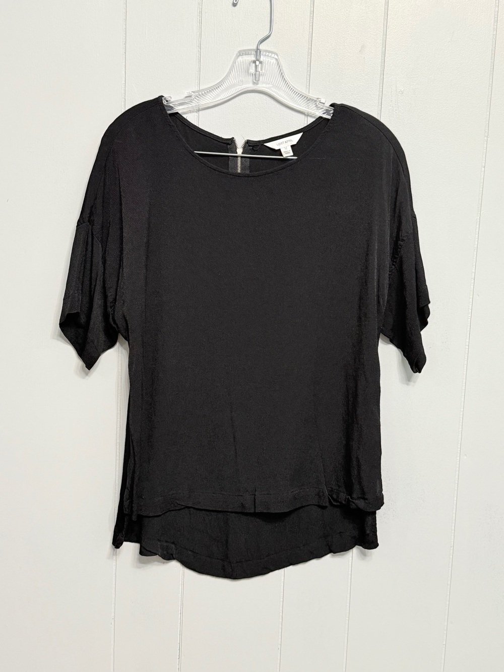 #7)  Lost April Black short sleeve top With back zipper closure